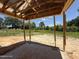 Unfinished back porch with exposed framing overlooking a lush green landscape at 235 Atkins Rd, Cameron, NC 28326