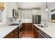 Well-equipped kitchen featuring stainless steel appliances, custom cabinets, and marble countertops at 241 Serenity Hill Circle Cir, Chapel Hill, NC 27516