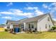 Exterior of home features a well-manicured lawn with mulch beds along the foundation and a spacious backyard at 2634 Yellow Pine Rd, Raleigh, NC 27616