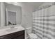 Traditional bathroom with a shower and dark cabinets at 2634 Yellow Pine Rd, Raleigh, NC 27616