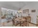Cozy dining area with natural light and a view into the living room at 2634 Yellow Pine Rd, Raleigh, NC 27616