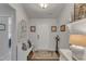Inviting foyer with a decorative bench and mirror, creating a warm welcome at 2634 Yellow Pine Rd, Raleigh, NC 27616