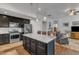 Modern kitchen with stainless steel appliances, granite countertops, and a central island at 2634 Yellow Pine Rd, Raleigh, NC 27616