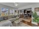 Open concept living space with modern furnishings and seamless flow to the dining and kitchen areas at 2634 Yellow Pine Rd, Raleigh, NC 27616