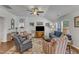 Well-lit living room with vaulted ceiling, furnishings, and a cozy atmosphere at 2634 Yellow Pine Rd, Raleigh, NC 27616