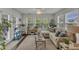 Bright living room featuring a comfortable sofa, natural light, and tasteful decor at 2634 Yellow Pine Rd, Raleigh, NC 27616
