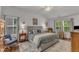 Cozy main bedroom with soft natural light, comfortable bedding, and calming decor at 2634 Yellow Pine Rd, Raleigh, NC 27616