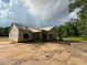 An exterior shot of a house in the framing stage on a lot surrounded by trees at 275 Atkins Rd, Cameron, NC 28326