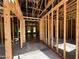 The interior framing of a house with visible beams, flooring, and natural light at 275 Atkins Rd, Cameron, NC 28326