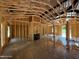 The interior framing with visible ceiling beams, framing, and natural light from outside at 275 Atkins Rd, Cameron, NC 28326