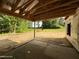 A patio in the framing stage with bare walls, concrete floor, and a grassy view at 275 Atkins Rd, Cameron, NC 28326