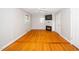 Bright bedroom features a ceiling fan, hardwood floors, fireplace, and natural light at 2925 Redwood Rd, Durham, NC 27704