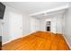 Bright bedroom has a ceiling fan, hardwood floors, and access to the bathroom at 2925 Redwood Rd, Durham, NC 27704