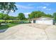 Spacious home with a pool, outdoor seating, and a well-maintained lawn at 2925 Redwood Rd, Durham, NC 27704