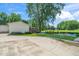 Backyard includes in-ground pool, pergola, seating and a fire pit area at 2925 Redwood Rd, Durham, NC 27704