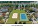 Aerial view of tennis court and volleyball court amenities available to residents at 308 Minton Valley Ln, Cary, NC 27519
