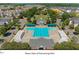 Aerial view of a community pool surrounded by lush trees and well-maintained homes at 308 Minton Valley Ln, Cary, NC 27519