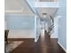 This home has a spacious foyer featuring hardwood floors and a two-story ceiling at 308 Minton Valley Ln, Cary, NC 27519