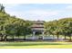 Beautiful gazebo surrounded by mature trees, set in a manicured lawn, perfect for relaxing at 308 Minton Valley Ln, Cary, NC 27519