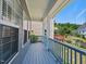 This lovely porch has a blue handrail and is located on the side of the home at 308 Minton Valley Ln, Cary, NC 27519