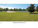 Expansive green recreation field featuring a sand volleyball court and space for tennis at 308 Minton Valley Ln, Cary, NC 27519