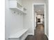 Hallway with storage and hooks for entryway at 309 Hines Point Dr, Rolesville, NC 27571