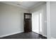 Inviting entryway featuring dark wood floors, a stylish front door, and plenty of natural light at 309 Hines Point Dr, Rolesville, NC 27571