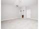 Spacious bedroom with a neutral color palette and view of bathroom at 3129 Elm Tree Ln, Raleigh, NC 27614