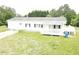 Single story house with front porch and large yard at 3354 Altamahaw Church Rd, Elon, NC 27244