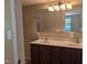 Bathroom with double sink vanity and a large mirror at 3405 Ode Turner Rd, Hillsborough, NC 27278