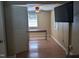 A well-lit room with hardwood floors, a ceiling fan, a window, and neutral walls at 3405 Ode Turner Rd, Hillsborough, NC 27278