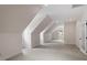 Large bonus room with neutral walls, carpeted floors, with natural light from surrounding windows at 3509 Carlton Square Pl, Raleigh, NC 27612
