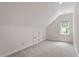 Bright bonus room featuring neutral walls, carpet floors, with natural light from surrounding window at 3509 Carlton Square Pl, Raleigh, NC 27612