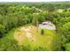 Wide angle shot showing an expansive wooded area at 3906 Union Ridge Rd, Burlington, NC 27217