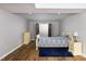 Basement bedroom with a window and a dresser and matching nightstands at 3906 Union Ridge Rd, Burlington, NC 27217