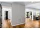 Spacious hallway that leads into a living room with natural light and plenty of space at 3906 Union Ridge Rd, Burlington, NC 27217