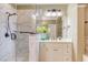 Bright bathroom featuring a glass enclosed shower with marble surround, offering a luxurious showering experience at 504 Belmont Cir, Wake Forest, NC 27587