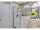 Bright bathroom featuring a glass enclosed shower with marble surround, offering a luxurious showering experience at 504 Belmont Cir, Wake Forest, NC 27587