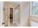 Standard bathroom, which features a tub/shower combo, and a white toilet, which offers water conservation at 504 Belmont Cir, Wake Forest, NC 27587