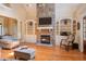 Charming living room with stone fireplace, built-in shelves, and cozy seating, ideal for gatherings at 504 Belmont Cir, Wake Forest, NC 27587