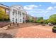 Cary Arts Center showcases grand architecture, manicured landscaping, brick pathways, creating an inviting space for arts and culture at 504 S Dixon Ave, Cary, NC 27511