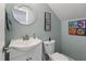 Well-lit bathroom with a stylish mirror and modern fixtures at 504 S Dixon Ave, Cary, NC 27511