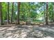 Wooded nature trail with pedestrian bridge for outdoor enjoyment at 504 S Dixon Ave, Cary, NC 27511