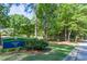 Dorothy Park sign with lush greenery creates a welcoming atmosphere at 504 S Dixon Ave, Cary, NC 27511