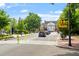 Street view of the Cary Arts Center with traffic signs, landscaping and a blue sky backdrop at 504 S Dixon Ave, Cary, NC 27511