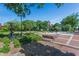 Town square with benches, landscaping, and an American flag at 504 S Dixon Ave, Cary, NC 27511