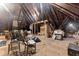 View of large attic with exposed wooden beams offering potential for conversion or extra storage at 517 N East St, Raleigh, NC 27604