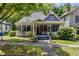 Charming Victorian home with a wrap-around porch and well-maintained landscaping at 517 N East St, Raleigh, NC 27604