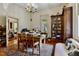 This home office features hardwood floors, lots of light, and built in shelving at 517 N East St, Raleigh, NC 27604