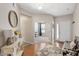 Inviting foyer with hardwood floors, white trim, and a view into the adjacent living spaces at 6512 Blalock Forest Dr, Willow Springs, NC 27592